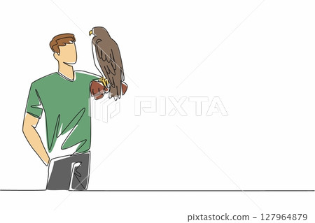 Continuous one line drawing black chested buzzard eagle perched on hand of man. Its natural habitat is in the open areas of South America. Man Holding Bird. Single line draw design vector illustration 127964879