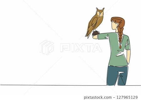 Continuous one line drawing long eared owl perched on hand of woman. Animals that really like shrubs. Has long ears. Stable population. Woman Holding Bird. Single line draw design vector illustration 127965129