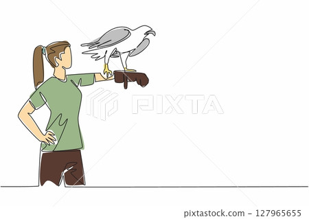 Continuous one line drawing sea eagle perched on hand of woman. Fish hunters, coastal predators and marine raptors. The strong claws. Woman holding bird. Single line draw design vector illustration 127965655