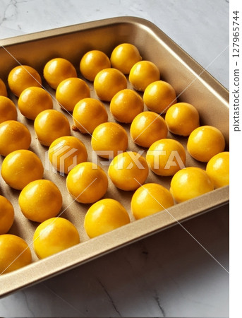 Pineapple cake, called Kue Nenas or Nastar in Indonesian, is one of the most popular traditional sweets to celebrate Eid al-Fitr. Indonesian people's favorite sweets. Selective focus. 127965744