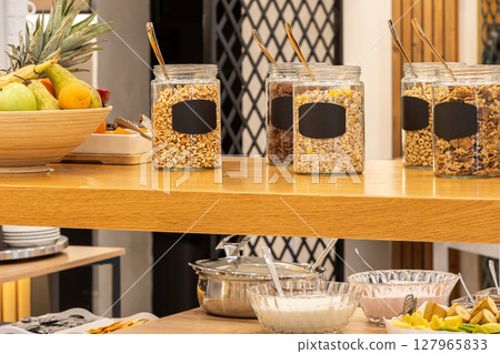 Hotel Buffet Breakfast with Cereal Options jars Hotel Buffet Breakfast with Cereal Options jars 127965833