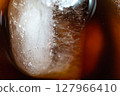 A macro shot of iced coffee at a coffee shop 127966410
