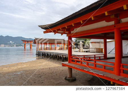 Itsukushima Shrine and iconic torii gate on Miyajima island, Japan 127967384
