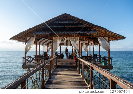 Wooden pier on Lake Poso in Tentena, Sulawesi, Indonesia 127967404