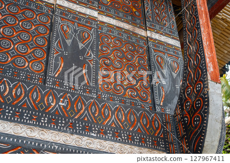 Detail of traditional Toraja house carvings, Sulawesi, Indonesia 127967411