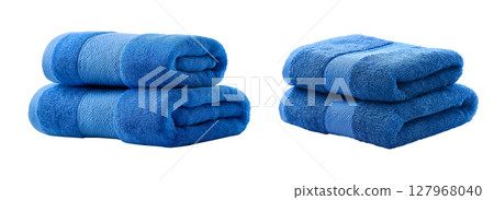 Blue cotton towels on white background - soft and absorbent Blue cotton towels on white background - soft and absorbent 127968040