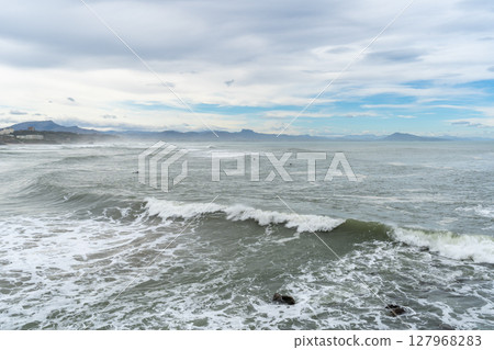 Green Cold Atlantic Ocean roll toward the rocky French coast near the Pyrenees Green Cold Atlantic Ocean roll toward the rocky French coast near the Pyrenees 127968283
