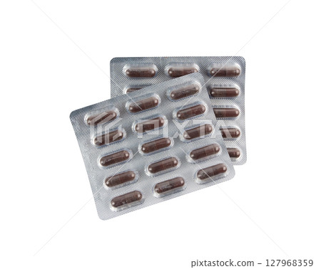 Iron capsule isolated, Fe pills, brown hemoglobin supplement tablets, vitamin capsules on white 127968359