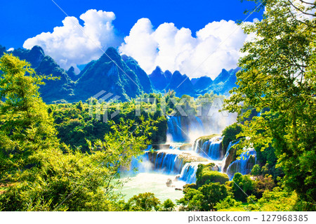 Cumulonimbus clouds over the Detian Waterfall in Nanning Cumulonimbus clouds over the Detian Waterfall in Nanning 127968385
