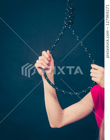 Woman holding suicide rope 127969271