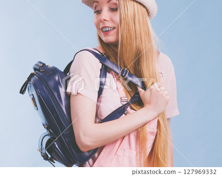 Young woman going to school Young woman going to school 127969332