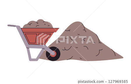 wheelbarrow filled with a greyish-brown material soil or sand next to pile of material suggests construction gardening landscaping 127969385