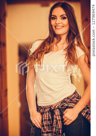 Happy cute pretty young woman girl at home. Happy cute pretty young woman girl at home. 127969474