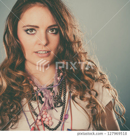 Pretty young woman girl wearing jewelry necklaces 127969518