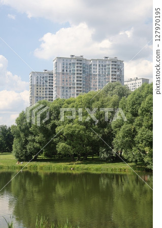 Summer sunset view of Yuzhnoe Butovo park in South Butovo district, Moscow, Russia. 127970195