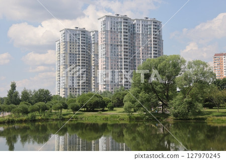 Summer sunset view of Yuzhnoe Butovo park in South Butovo district, Moscow, Russia. 127970245