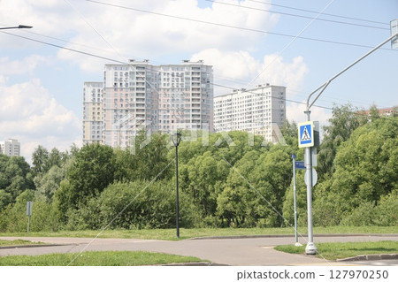 Summer sunset view of Yuzhnoe Butovo park in South Butovo district, Moscow, Russia. Summer sunset view of Yuzhnoe Butovo park in South Butovo district, Moscow, Russia. 127970250