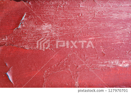 Wooden texture with cracked paint. texture of cracked from time painted red door 127970701