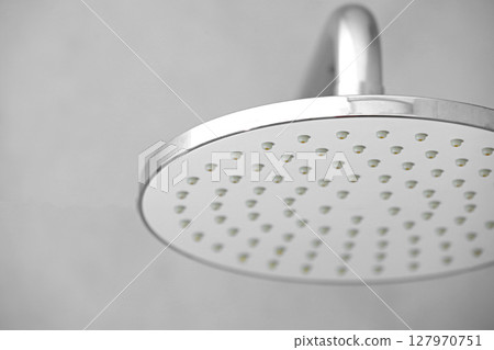 Dirty calcified shower mixer tap, faucet with limescale on it, plaque from water, Chrome-plated shower, close up photo Dirty calcified shower mixer tap, faucet with limescale on it, plaque from water, Chrome-plated shower, close up photo 127970751