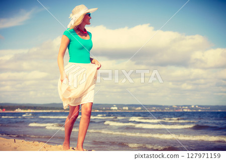 Pretty woman wearing nice clothing. Pretty woman wearing nice clothing. 127971159