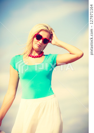 Attractive woman on the beach. 127971164