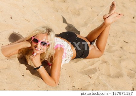 Pretty girl on beach. Pretty girl on beach. 127971187