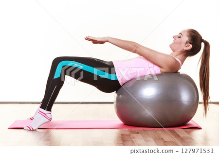 Fit girl working out. 127971531