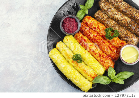 Assortment of fresh grilled sausages. Assortment of fresh grilled sausages. 127972112