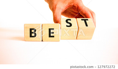 Motivational and inspirational be best symbol. Concept words Be best on beautiful wooden block. Beautiful white background Businessman hand. Business motivational be best concept. Copy space. 127972272