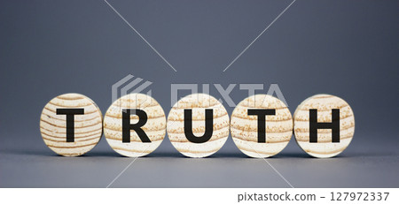 Truth symbol. Concept word Truth on beautiful wooden circles. Beautiful grey table grey background. Business lifestyle truth concept. Copy space. 127972337