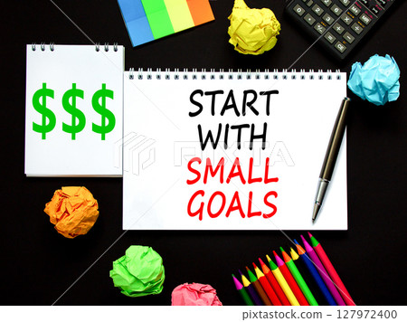 Start with small goals symbol. Concept words phrase Start with small goals on beautiful white note. Colored paper. Beautiful black background. Business Start with small goals concept. Copy space 127972400