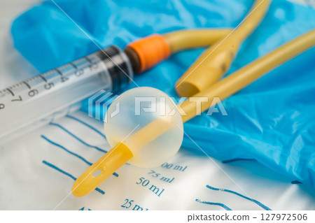 Foley catheter and urine drainage bag collect urine for disability or patient in hospital. 127972506