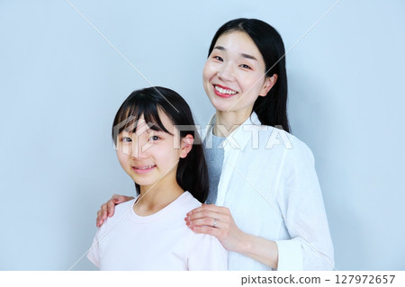 Mother and daughter image of close friends 127972657
