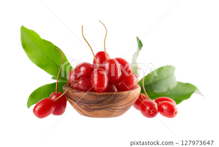 Elaeagnus multiflora isolated on white background. Cherry elaeagnus or cherry silverberry in wooden bowl. Goumi or gumi berry. 127973647