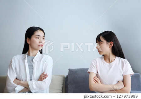 Image of daughter and mother arguing Image of daughter and mother arguing 127973989