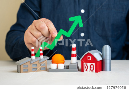 The man notes the growth of industrial production and the economy. Rising factory orders, export performance, government statistics. Renewed investor interest in the industrial sector. 127974056