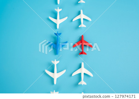 Two planes and two oppositely directed flows of aircraft. Competition in aerospace. Broader industry polarization. Competing airlines Two planes and two oppositely directed flows of aircraft. Competition in aerospace. Broader industry polarization. Competing airlines 127974171