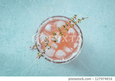 Salty Dog cocktail with fresh grapefruit juice, lime juice, and thyme Salty Dog cocktail with fresh grapefruit juice, lime juice, and thyme 127974658