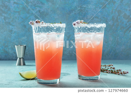 Salty Dog cocktail with fresh grapefruit juice, lime juice, and thyme Salty Dog cocktail with fresh grapefruit juice, lime juice, and thyme 127974660