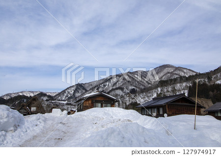 Old houses in Shirakawa-go, Gifu Prefecture in early spring 127974917