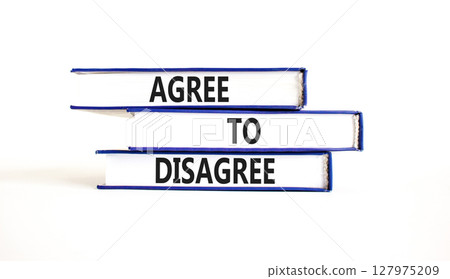 Agree to disagree symbol. Concept words Agree to disagree on beautiful books. Beautiful white paper background. Business and agree to disagree concept. Copy space. Agree to disagree symbol. Concept words Agree to disagree on beautiful books. Beautiful white paper background. Business and agree to disagree concept. Copy space. 127975209
