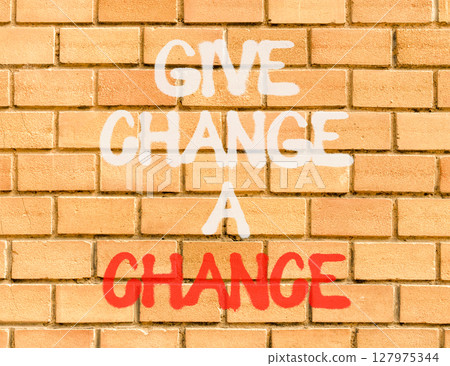 Give change a chance symbol. Concept words phrase Give change a chance on beautiful brown brick wall. Beautiful brown brick wall background. Business Give change a chance concept. Copy space. 127975344