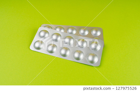Pill Blister on Color Background, Silver Medicine Capsule Package, Drugs Packaging, Pill Pack 127975526