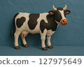 Clay animation cow 127975649