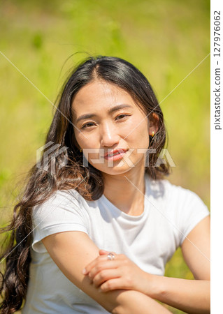 Smile of a young lady 127976062