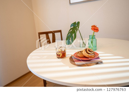 Delicious bread, coffee and glasses Delicious bread, coffee and glasses 127976763