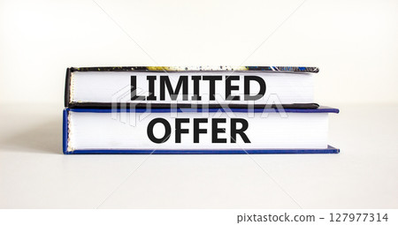 Limited offer symbol. Concept words Limited offer on beautiful books. Beautiful white table white background. Business marketing, motivational Limited offer concept. Copy space. 127977314
