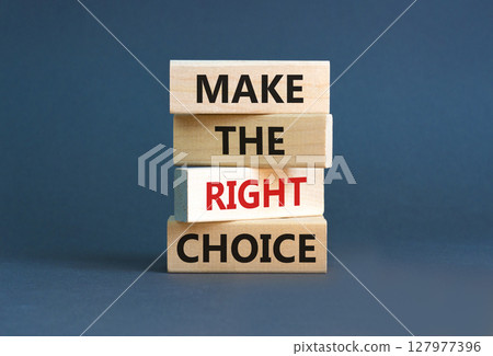 Make the right choice symbol. Concept words phrase Make the right choice on beautiful wooden blocks. Beautiful grey paper background. Business Make the right choice concept. Copy space. 127977396