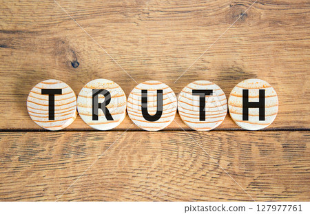 Truth symbol. Concept word Truth on beautiful wooden circles. Beautiful wooden table wooden background. Business lifestyle truth concept. Copy space. 127977761