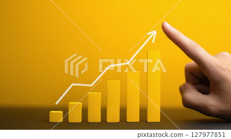Growth Chart: Yellow bars representing increasing progress, emphasized by an upward arrow and a pointing finger. Illustrating success and business growth. 127977851